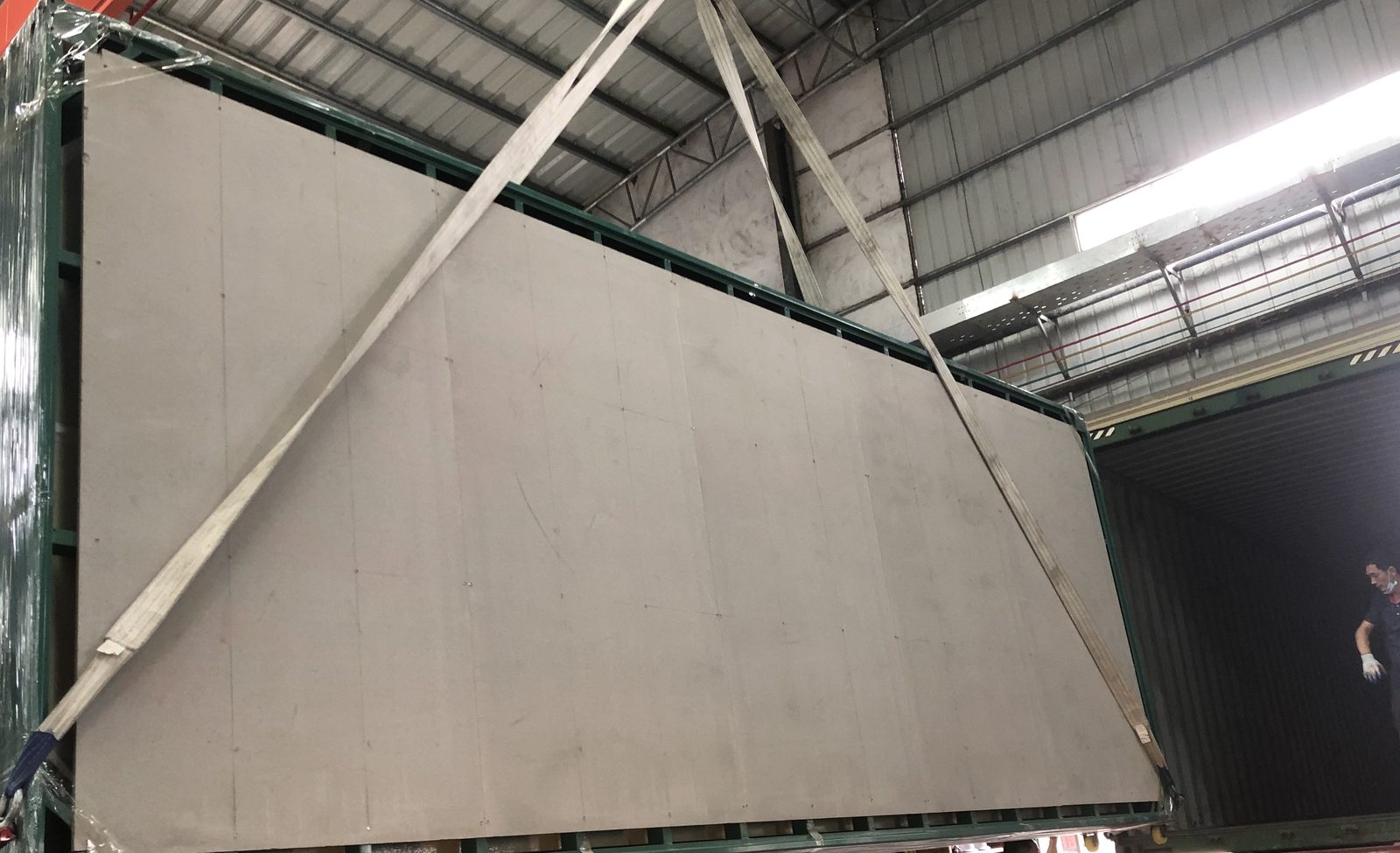 Large cladding panel being lifted for loading